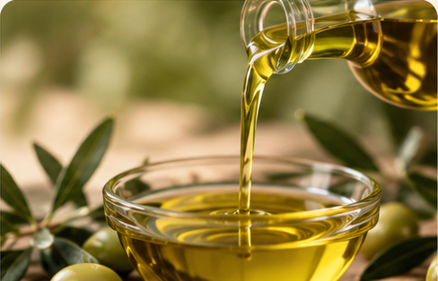 Aceite de oliva dorado, símbolo de grasas saludables